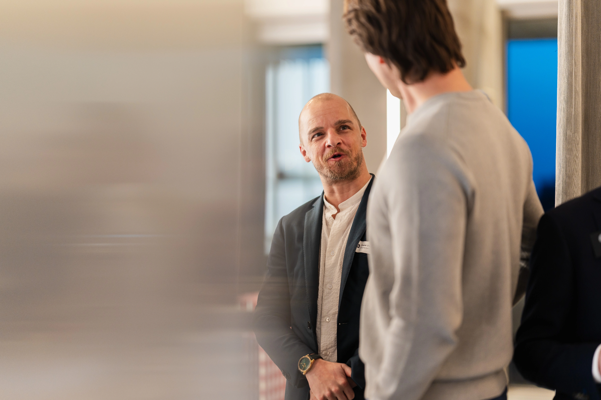 Professional conversation at networking event