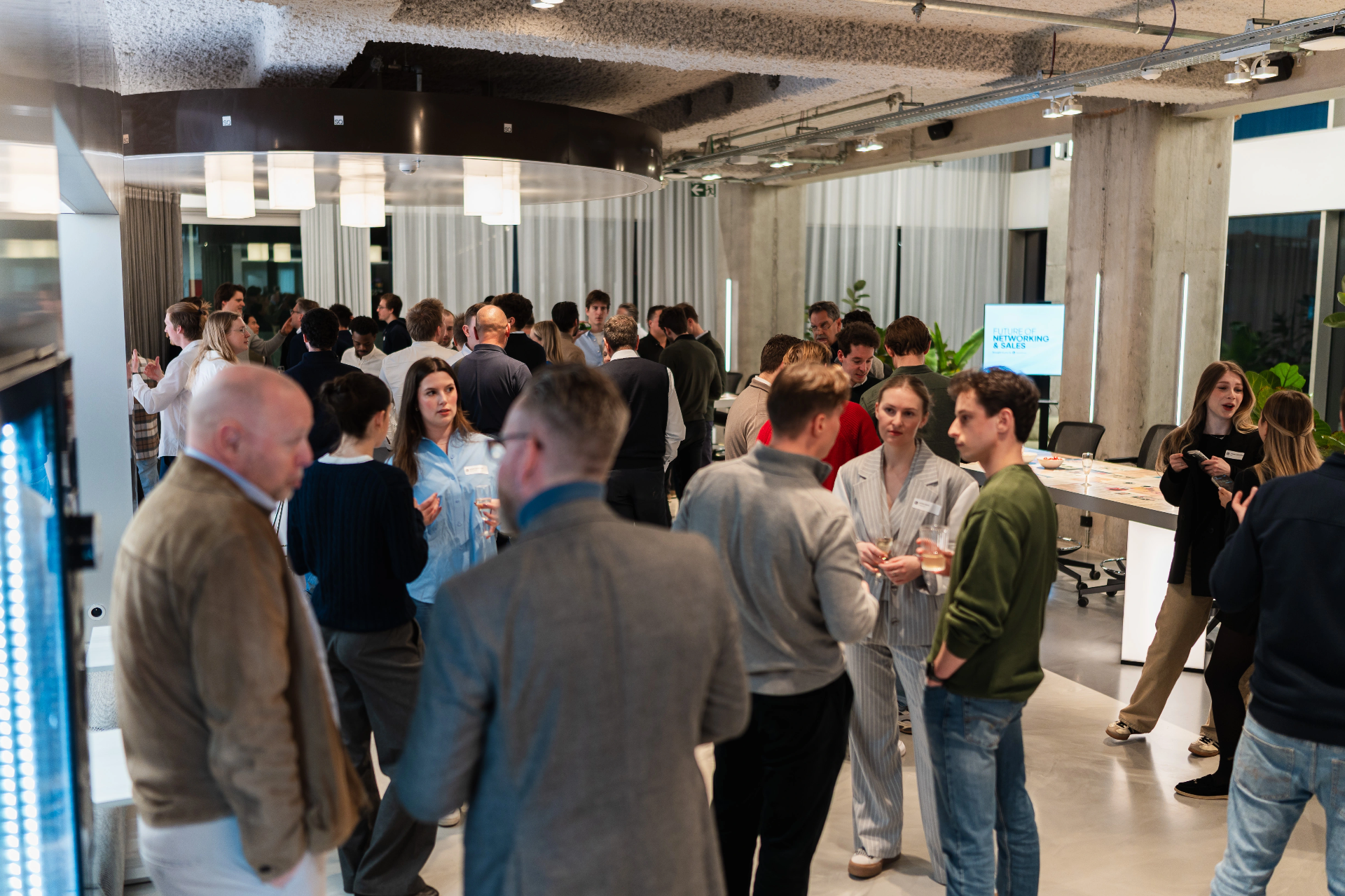 Large crowd networking at SpeakSoon launch event